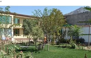 د Afghans4Tomorrow Guest House لوګو